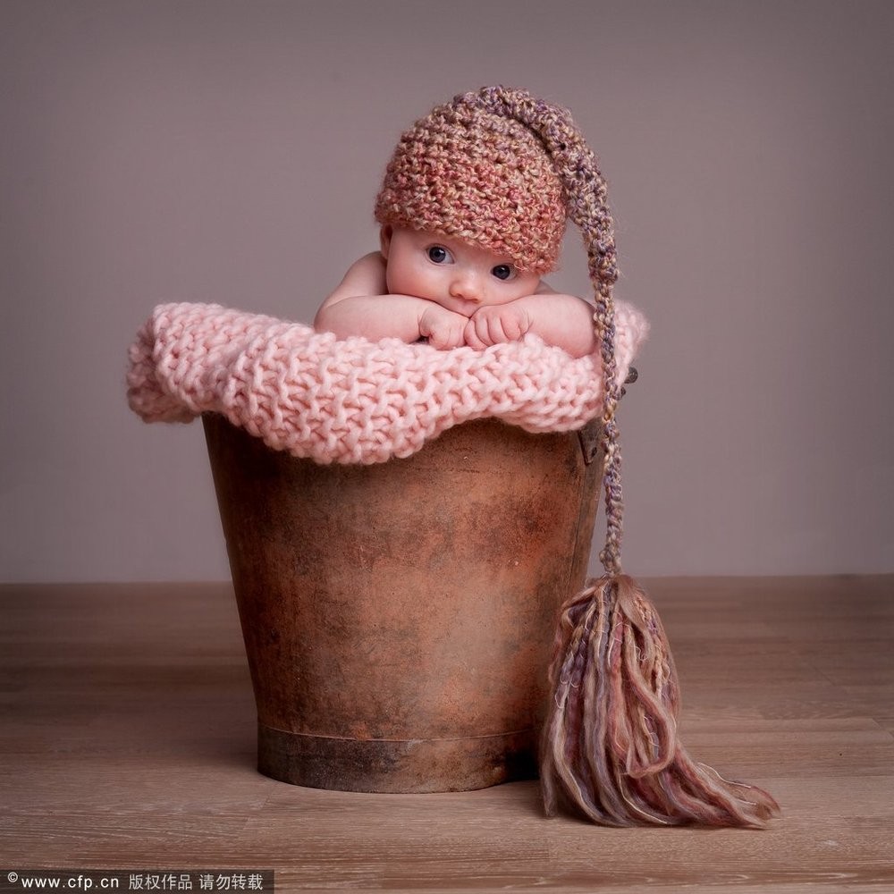 英国摄影师为新生婴儿拍摄写真